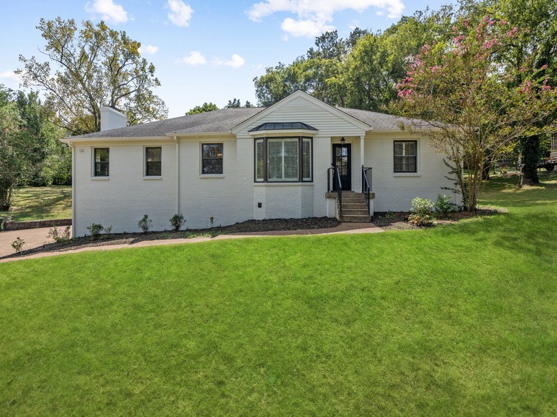 Step into luxury with this stunning 4 bedroom, 4.5 bath, w bonus/flex space! This gorgeous home is set on a 1+ AC picturesque corner lot in one of Nashville’s most desired neighborhoods. Recently meticulously remodeled to perfection, this home boasts a stylish library/office, sitting/cocktail room, garage parking for up to 4 cars, generous driveway for multiple vehicles, bonus room with endless possibilities – theatre room, playroom, additional bed or in-law space! Downstairs is counted as a bedroom and has potential of being a rentable space or in-law suite. Check out the generous storage and “hidden back room” that can be easily converted into a wine cellar. This home is a MUST see!